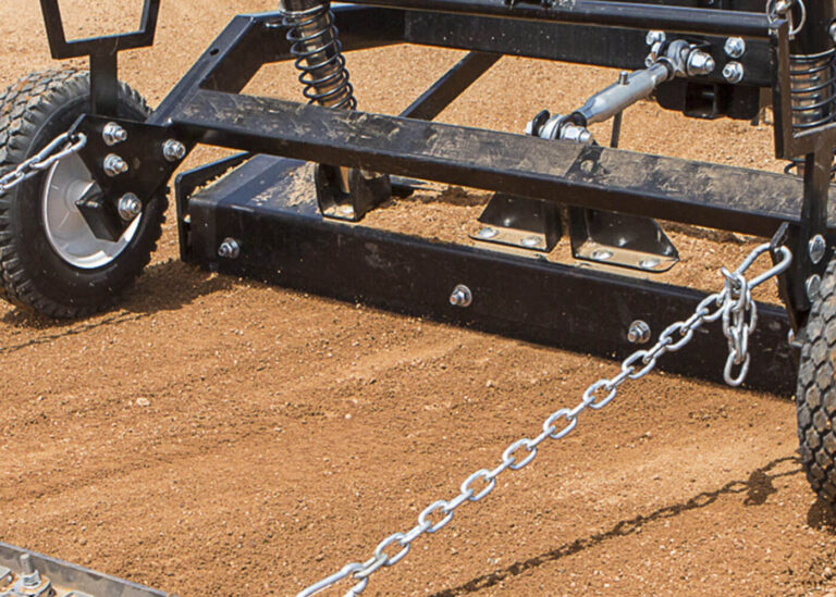 ABI Equipment Infield Grader in a very close-up view.